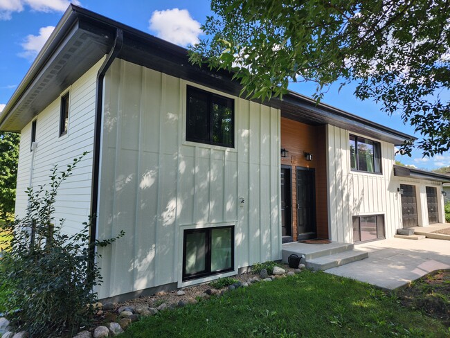 Brand new exterior with new energy efficient windows - 16251 Franklin Trl SE Townhome