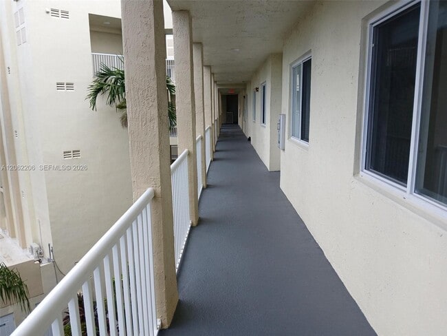 Building Photo - 10770 NW 66th St Unit 412