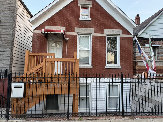 Building Photo - 2637 W 21st Pl Unit 2637 W 21st Place-Basement