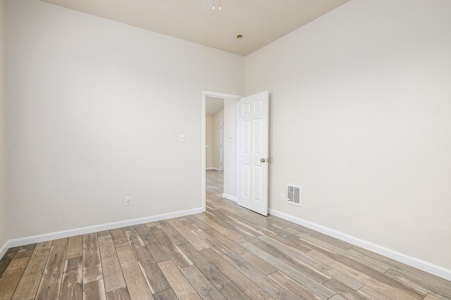 Bedroom exits into the kitchen. - 512 Barrett Ave Unit 512