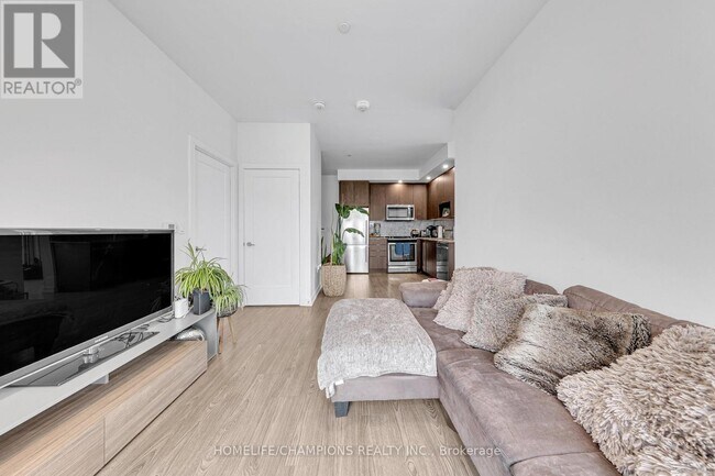 Photo - 225 Village Green Square Unit PH08