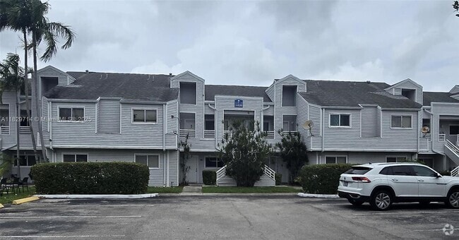 Building Photo - 3409 NW 44th St Unit 201 Rental