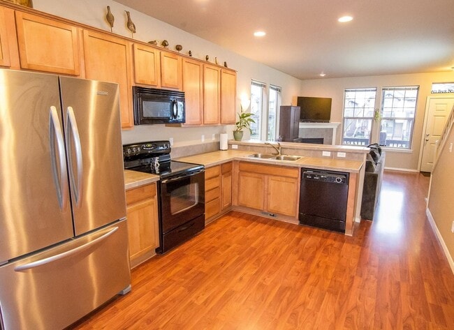 Photo - Fabulous 2 Bedroom 2.5 Bathroom Townhome with Vaulted Ceilings, Private Yard & Spacious Tandem Ga...