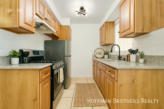 Building Photo - 6561 Fulton Ave Unit 5