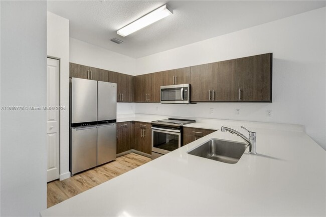 Photo - 15500 SW 136th St Unit 103