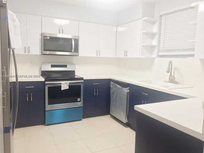 Building Photo - 14971 SW 82nd Ln Unit 20-308