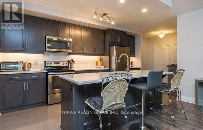 Photo - 260 Villagewalk Blvd Unité 707