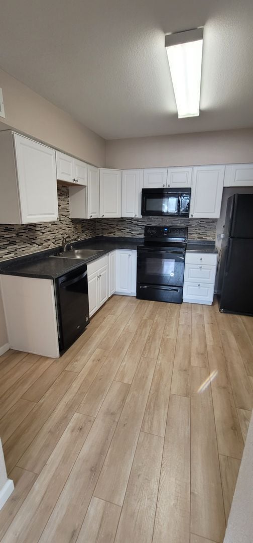 Building Photo - $1250 | 1BR/1BA | Cute Condo in a Fourplex... Unit 4