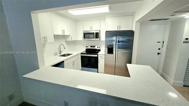 Building Photo - 255 S Cypress Rd Unit 307