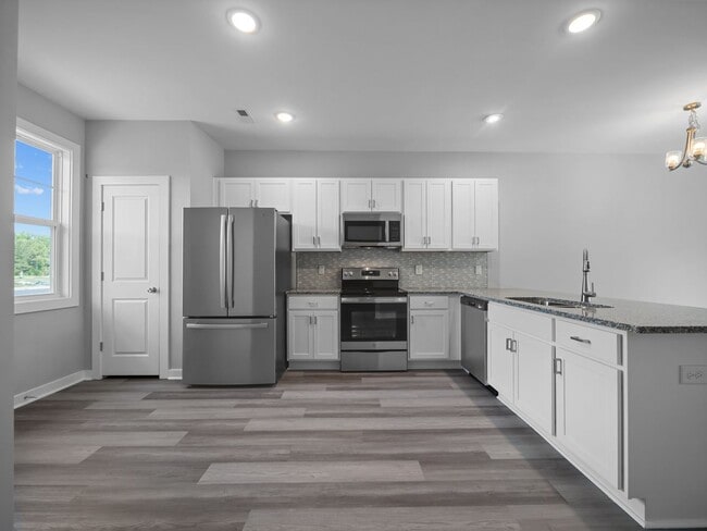 Photo - Large 3 story townhome near beach with community POOL and GYM!