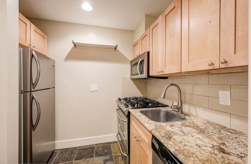 Photo - Treat yourself to $1000 off your first months rent with this darling one bedroom in Queen Anne.