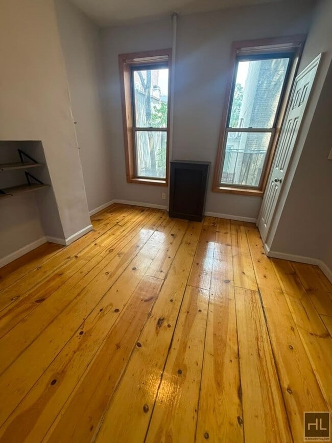 Building Photo - Classic East Village One-Bedroom with Exposed Brick & High Ceilings