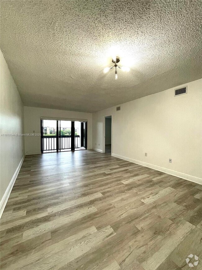 Building Photo - 8875 Fontainebleau Blvd Unit 202 Rental