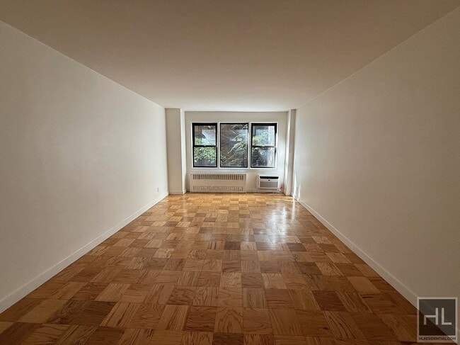 Building Photo - EAST 36 STREET Unit 1C
