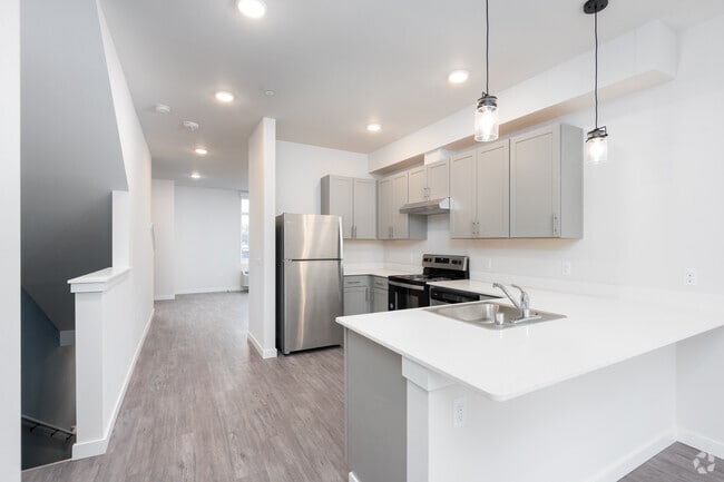 3HAB, 3,5BA - 1,325-1,347SF (Condominio esquinero) - Westman Mills Townhome & Apartments