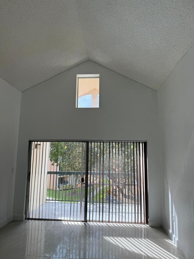 Building Photo - 6276 NW 186th St Unit 310