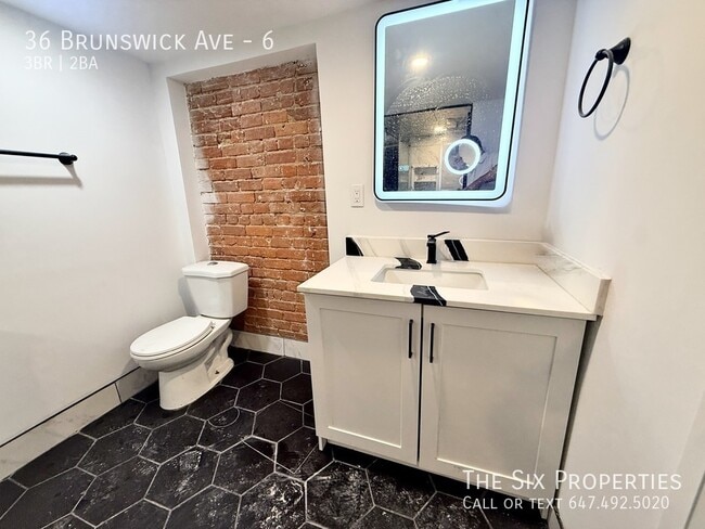 Photo - Brand New 3 Bedroom + 1.5 Bath Lower Level Apartment in the Heart of Downtown Unit 6