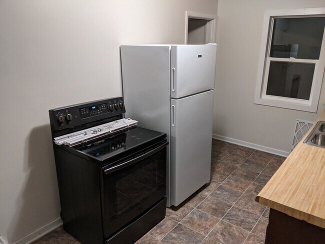 Photo - 2-1 House with Garage available 12/13/2025