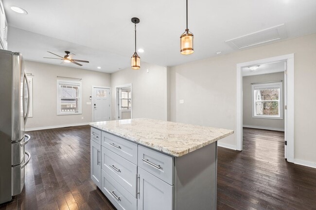Photo - Cheery downtown bungalow with stunning finishes and fenced back yard.