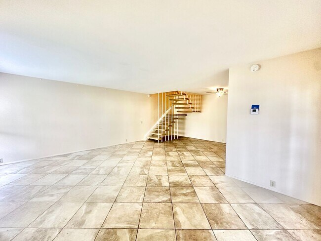 Photo - Spacious Condo with A Large Patio and Upstiars Balcony! Parking and Water Included!