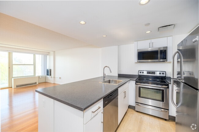 2BR, 2BA - 750SF -Kitchen & Living Room