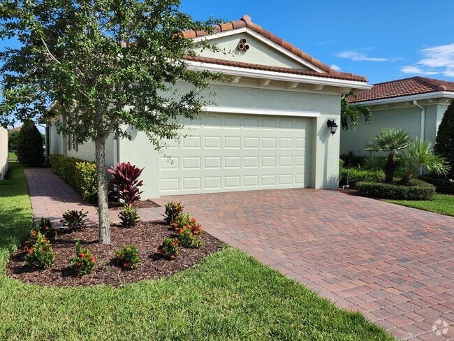 Building Photo - 2 BR w/ den  2 BA 2 CG villa in the the PG... Rental