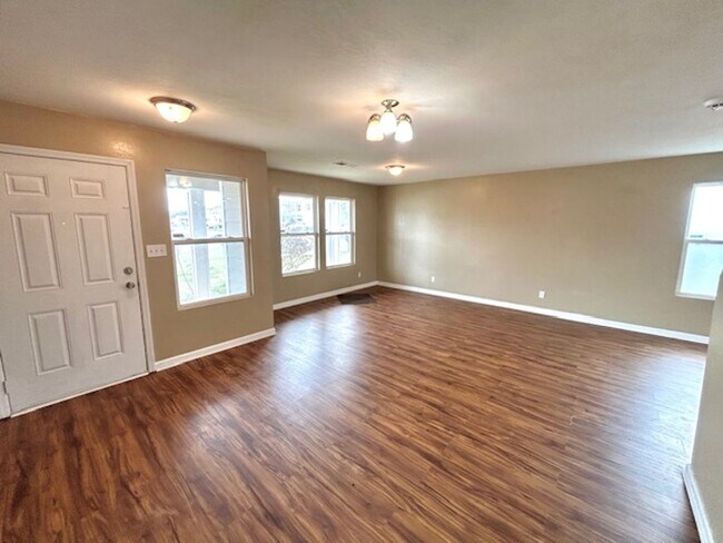 Photo - Move In Ready!-Charming 3 -bedroom Home with a move in special-$300 off first month's rent.