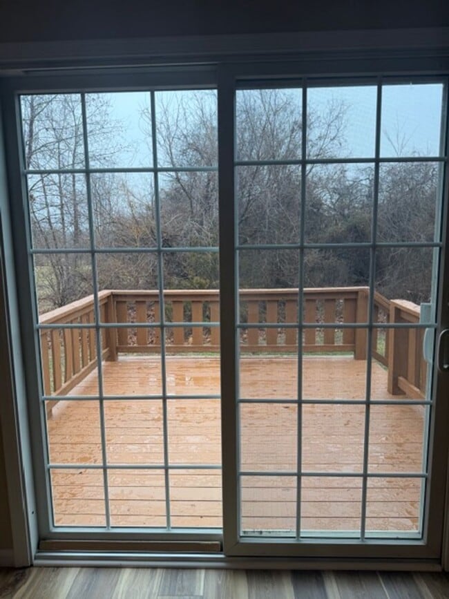 Photo - 3 Bedroom 2 full bath home with oversized 2 car garage new vinyl flooring and community pool access