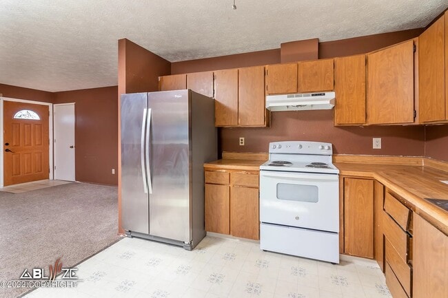 Building Photo - 7541 Peck Ave Unit 3