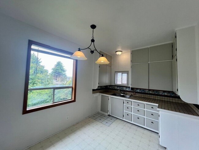 Photo - Charming 3-Bedroom Home with Backyard & Patio