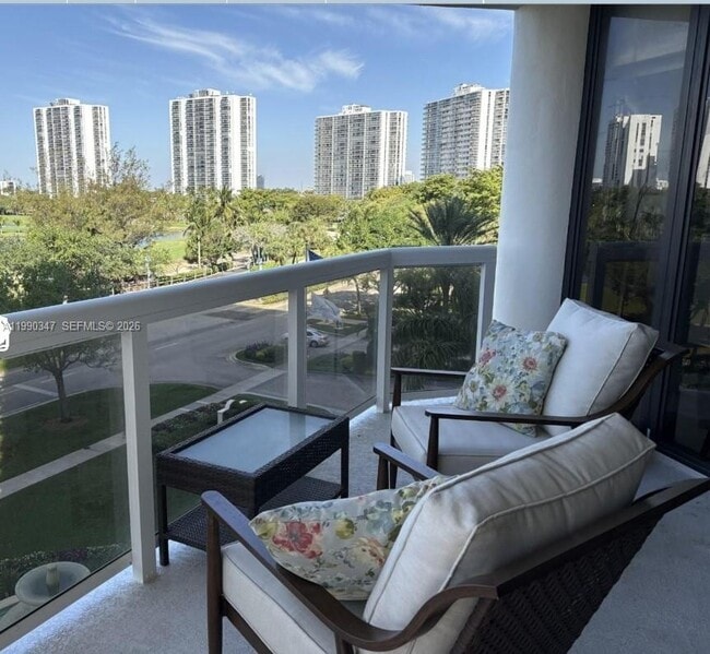 Building Photo - 20185 E Country Club Dr Unit 405