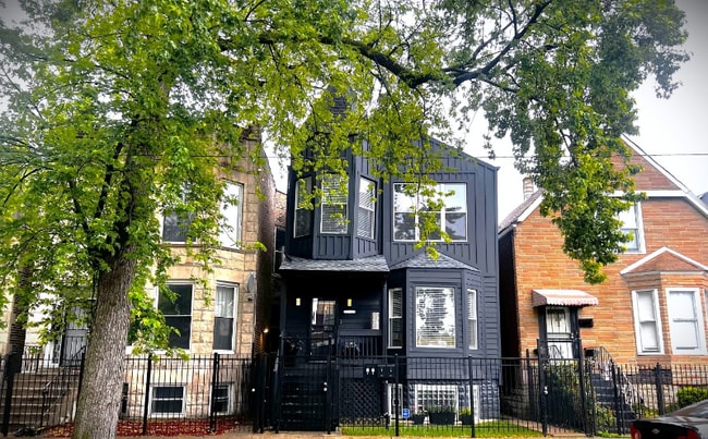 Building Photo - 6613 S Langley Ave Rental