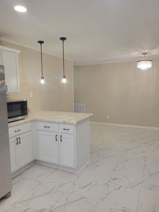 Photo - Spacious & Versatile Living in a Prime Location!