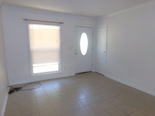 Photo - 2BR/1BA Milton Duplex with Huge Fenced Backyard, Tile Flooring Throughout & Convenient Access to ...