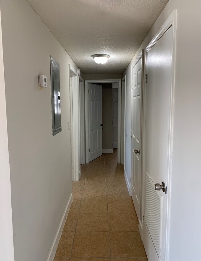 Photo - Spacious 4-Bedroom, 2-Bath Home with Fence...