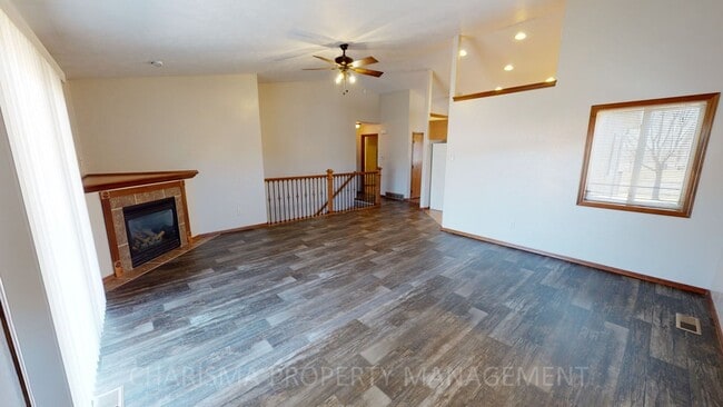 Photo - BEAUTIFUL 3 BD, 2 BA TOWNHOME WITH A FULLY EQUIPED KITCHEN, VAULTED CEILINGS, FIREPLACE, ATTACHED...