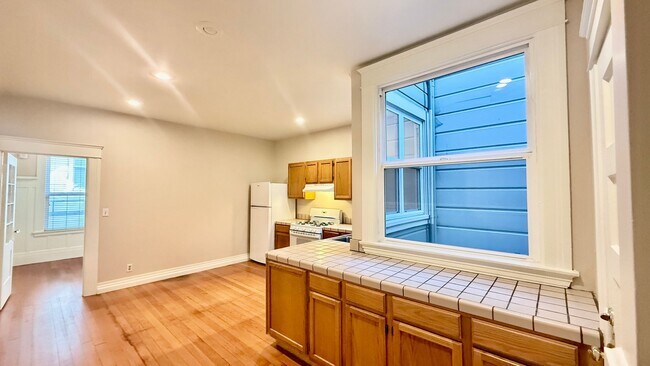 Photo - Charming Updated Top Floor 2BR/1BA Marina Apartment w/ Golden Gate Bridge Views! AMSI