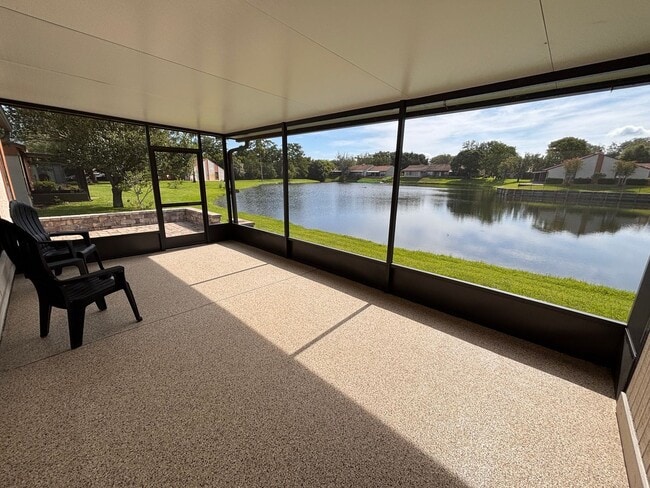 Building Photo - 2 Bed 2 Bath Luxury Waterfront Townhome with Screened Lanai & Garage!