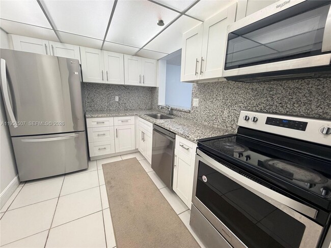 Building Photo - 8760 SW 133rd Avenue Rd Unit 217