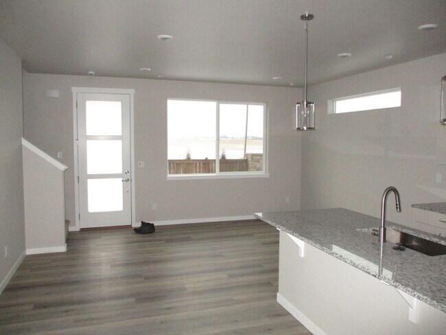 Photo - 3 Bed, 2.5 Bath Home in Berthoud - Built 2024 - 2-Car Garage, Home is facing the Mountains