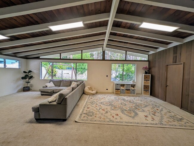 Photo - Country living in the City - Huge bonus room, entertainment deck, covered lanai and lots of storage.