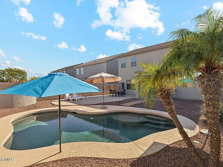 Photo - "Spacious 4-Bed Oasis with Pool on East Goldmine Court – 2,425 Sq Ft of Comfort!"
