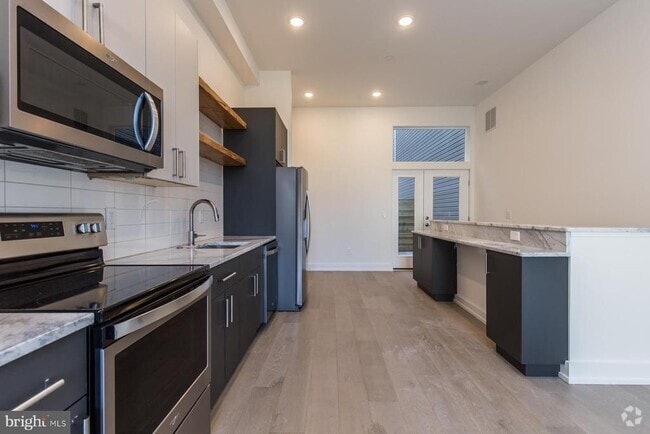 Building Photo - 1339 N Marston St Unit 1 Rental