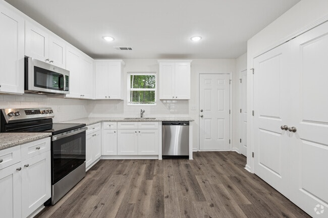 2BR, 2.5BA - 1,022SF - Kitchen - Villages at Ram