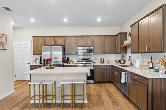 Photo - 3BR Center Lake Townhome | 2-Car Garage, Loft & Resort-Style Amenities