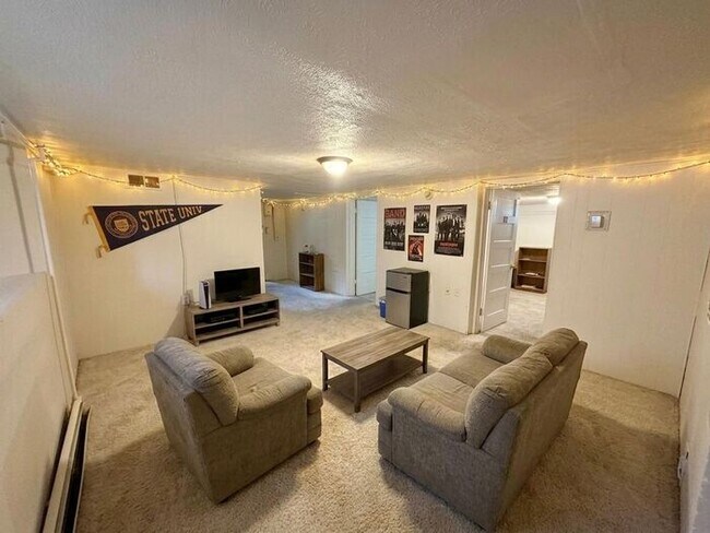 Photo - 1/2 Off First Months Rent! 3 Bed + 2 bonus rooms in basement, 2 Bath Home NEAR CSU! Flexible leas...