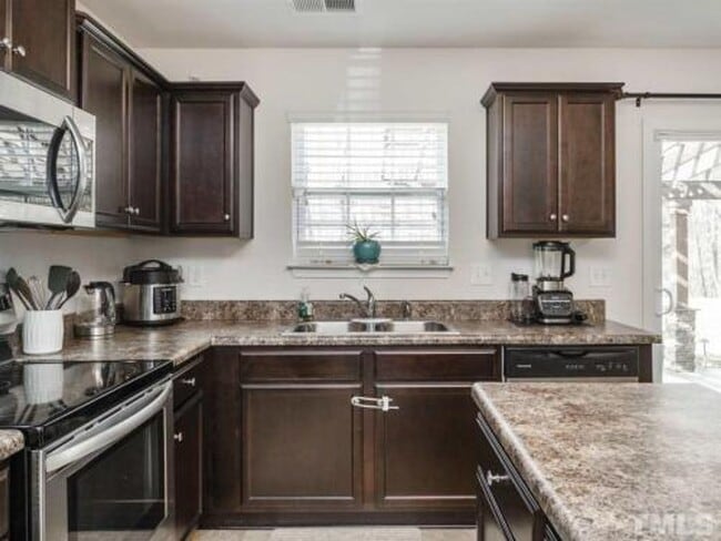 Photo - Spacious 3BR/2.5BA 2-Story Home with Open Floor Plan, Cul-de-Sac Charm, and Luxurious Features – ...