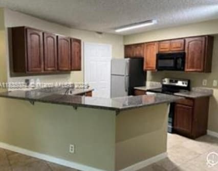 Building Photo - 9999 Summerbreeze Dr Rental