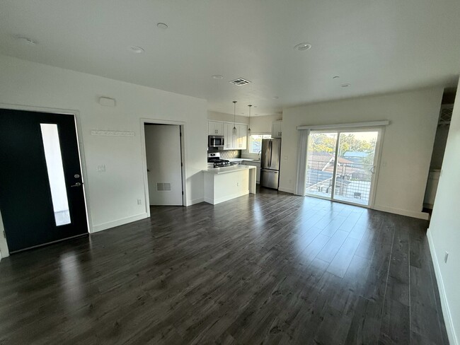 Living Room & Kitchen - 3722 Florida St Apartments Unit 3