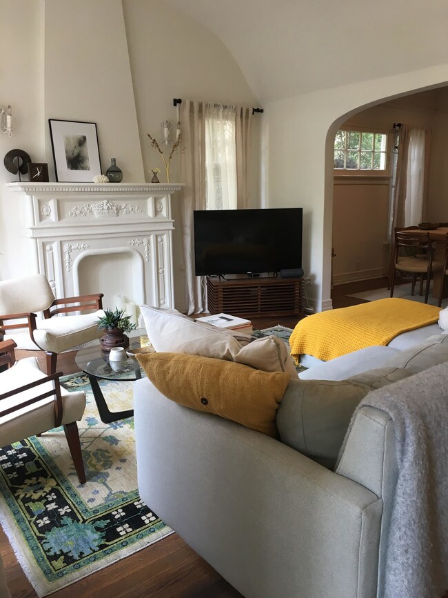 Living Room as decorated by prior tenant - 1010 Havenhurst Dr House Unit 1010